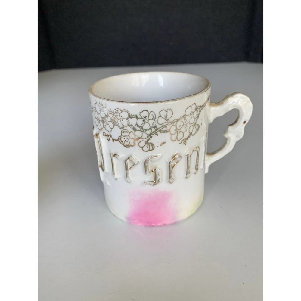Vintage white “present” cup mug germany.